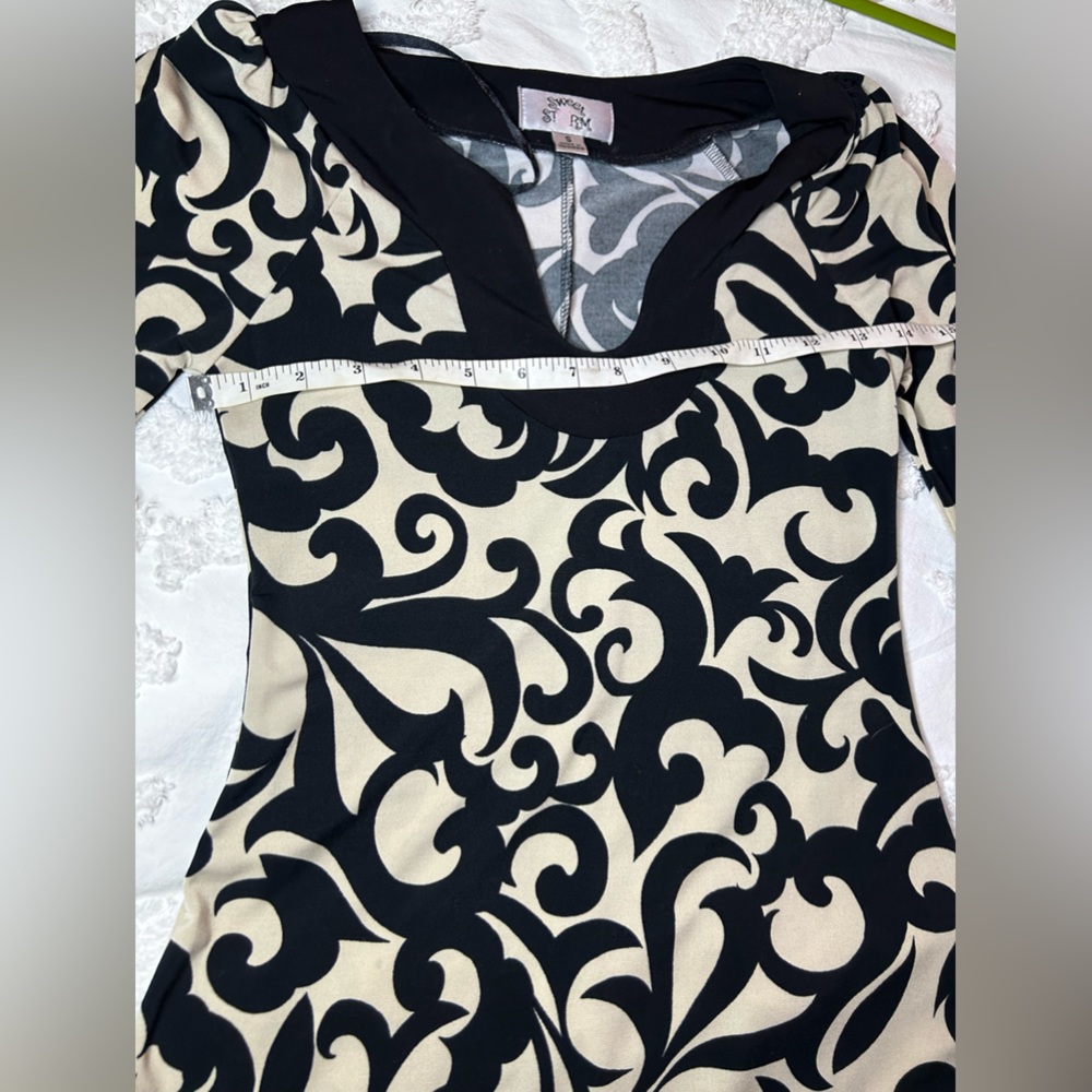 Sweet Storm brand cream and black dress